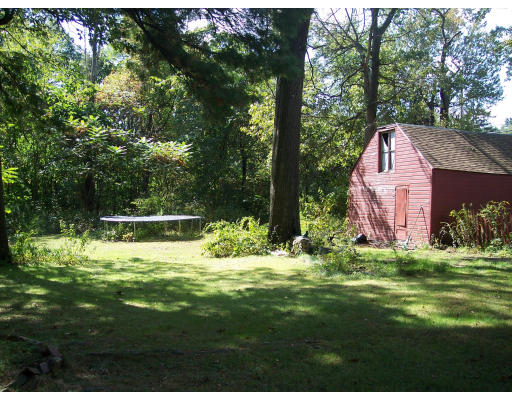 650 County Road Holyoke, MA 01040 - Photo 5 of 14 a garden with trees in the background
