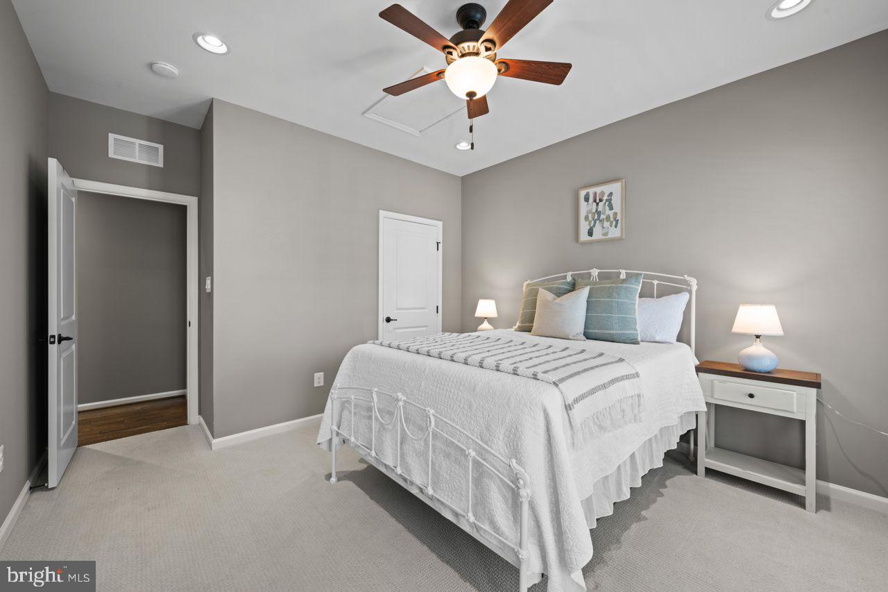3026 Sunny Ridge Drive Odenton, MD 21113 - Photo 20 of 49 Serene bedroom with modern charm.
