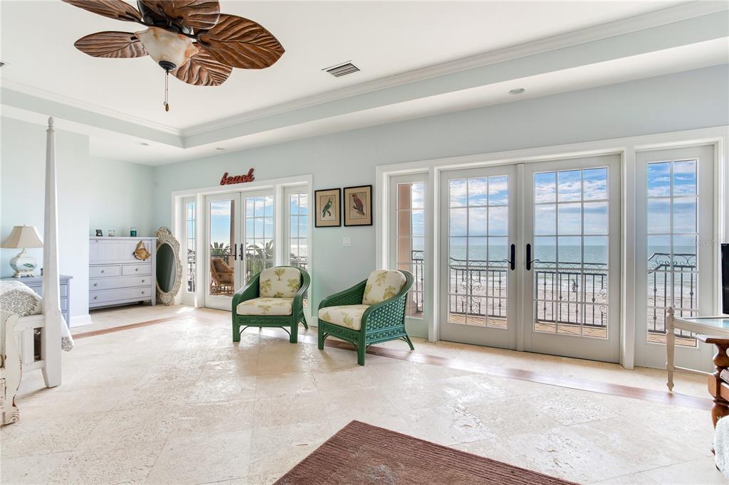 16116 Gulf Boulevard Redington Beach, FL 33708 - Photo 13 of 49 a living room with furniture and a floor to ceiling window