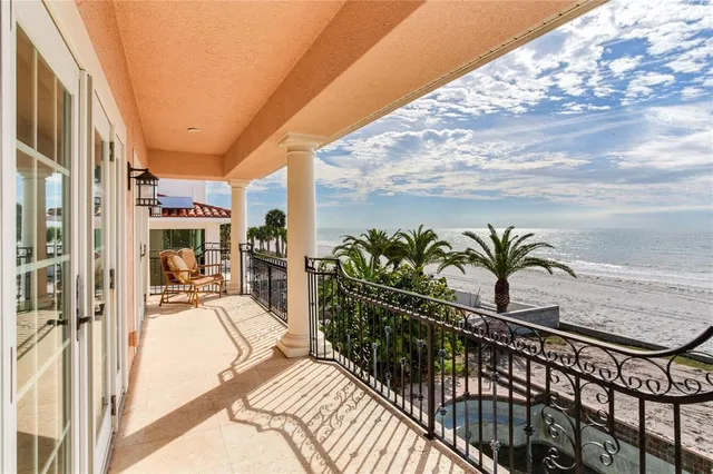 a view of balcony with furniture