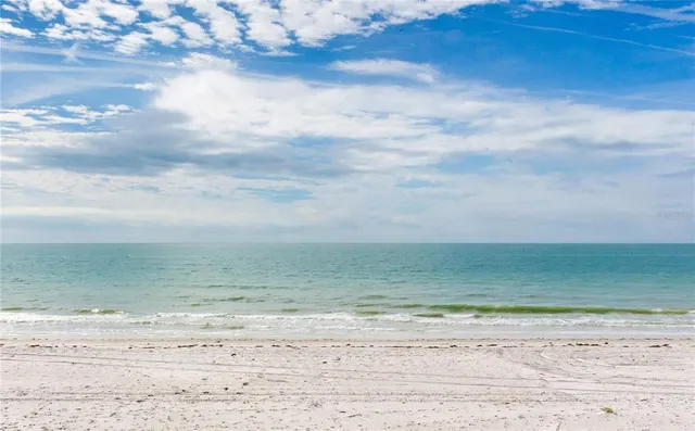 a view of beach and ocean