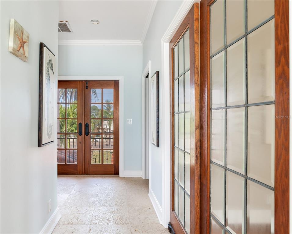 16116 Gulf Boulevard Redington Beach, FL 33708 - Photo 22 of 49 a view of an entryway with a floor to ceiling window