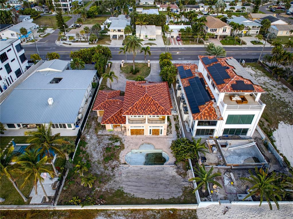 16116 Gulf Boulevard Redington Beach, FL 33708 - Photo 45 of 49 an aerial view of multiple houses with yard