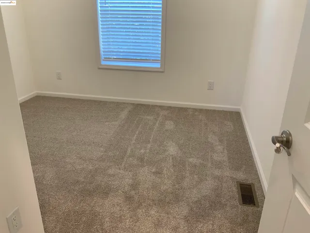 an empty room with closet