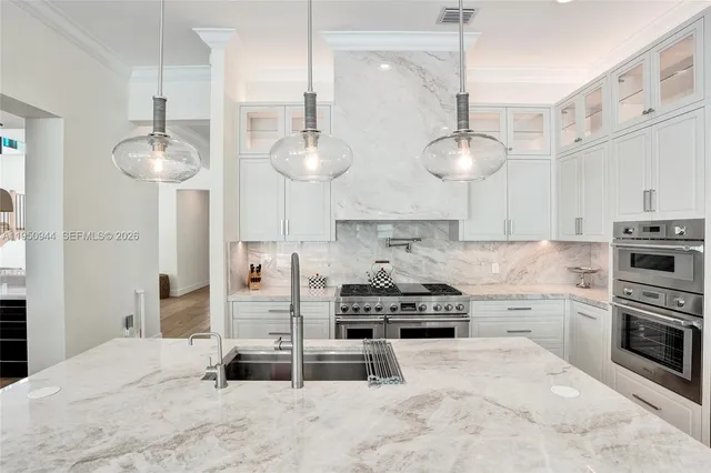 a close up of a white marble wall