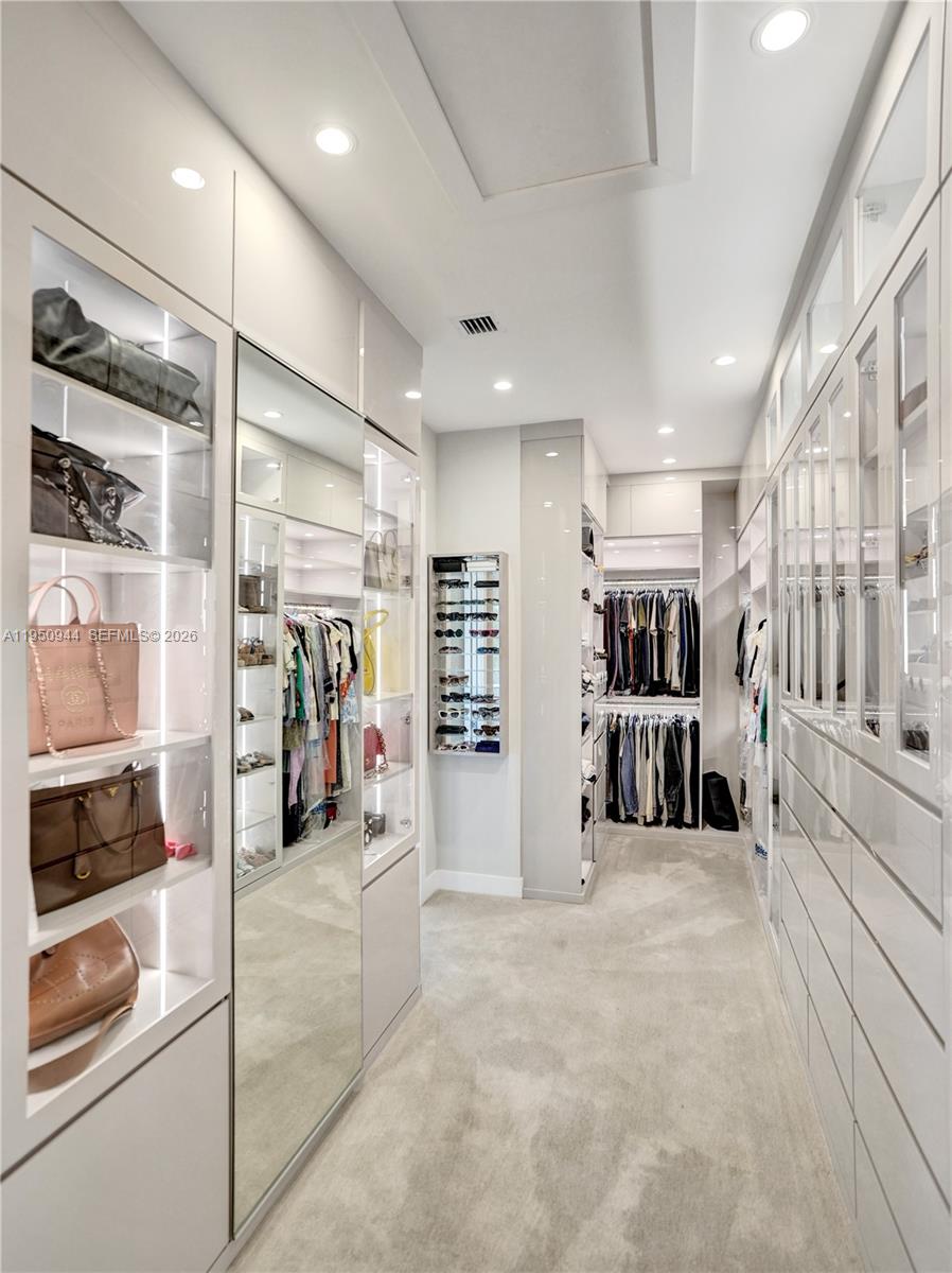 17385 Ponte Chiasso Drive Boca Raton, FL 33496 - Photo 33 of 38 a view of a room with shelves