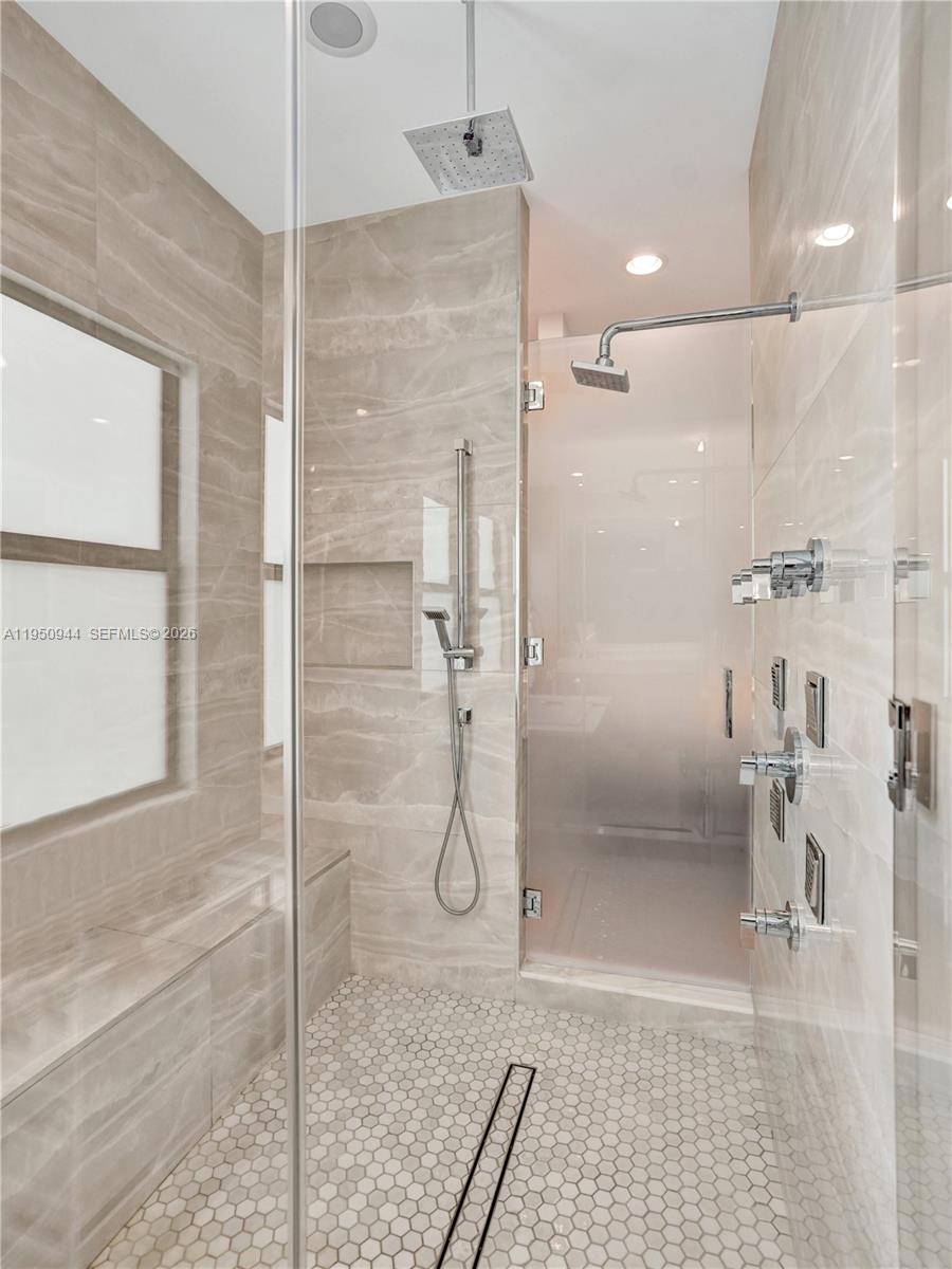 17385 Ponte Chiasso Drive Boca Raton, FL 33496 - Photo 36 of 38 a bathroom with a shower