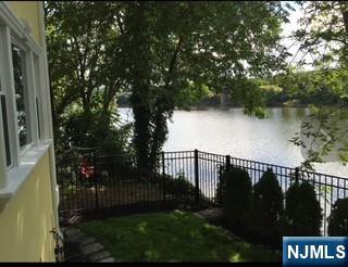 506 Riverside Avenue Rutherford, NJ 07070 - Photo 3 of 12 a view of a street from a balcony