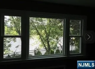 a view of a large window with an outdoor space