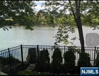 506 Riverside Avenue Rutherford, NJ 07070 - Photo 5 of 12 a view of swimming pool from a lake