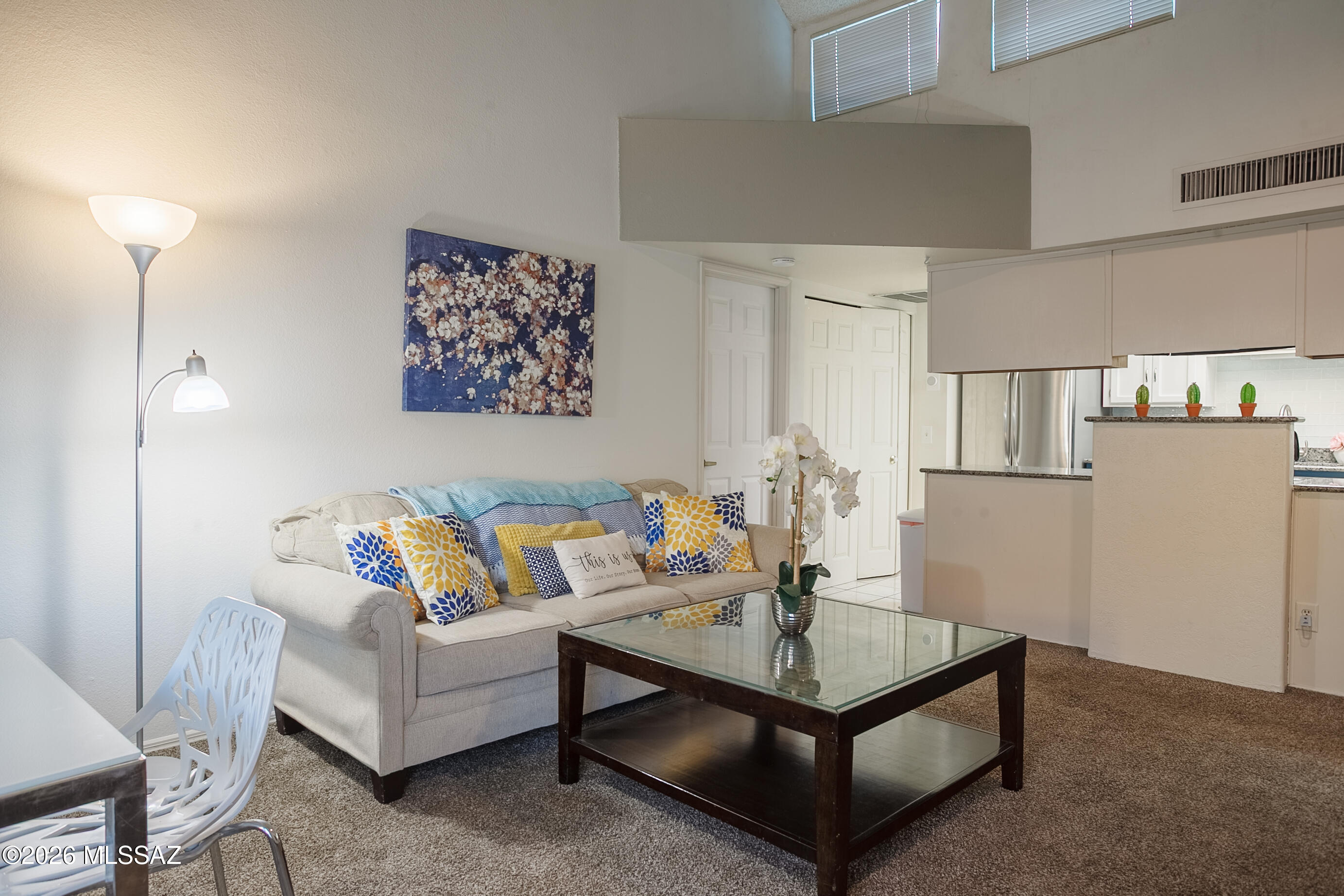 1200 East River Road, Unit B27 Tucson, AZ 85718 - Photo 8 of 40 a living room with furniture