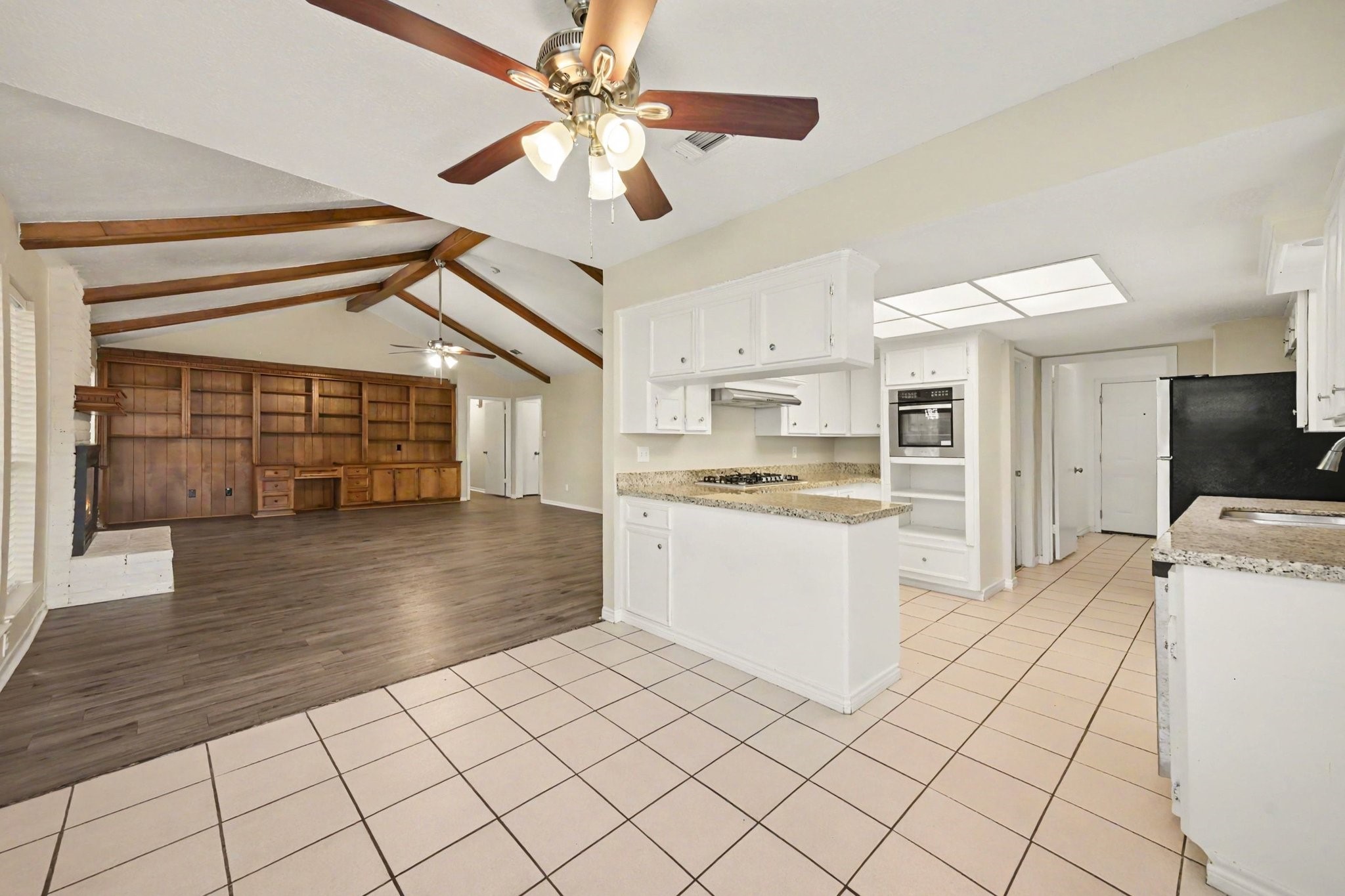 17419 Cassina Drive Spring, TX 77388 - Photo 14 of 35 a large white kitchen with cabinets