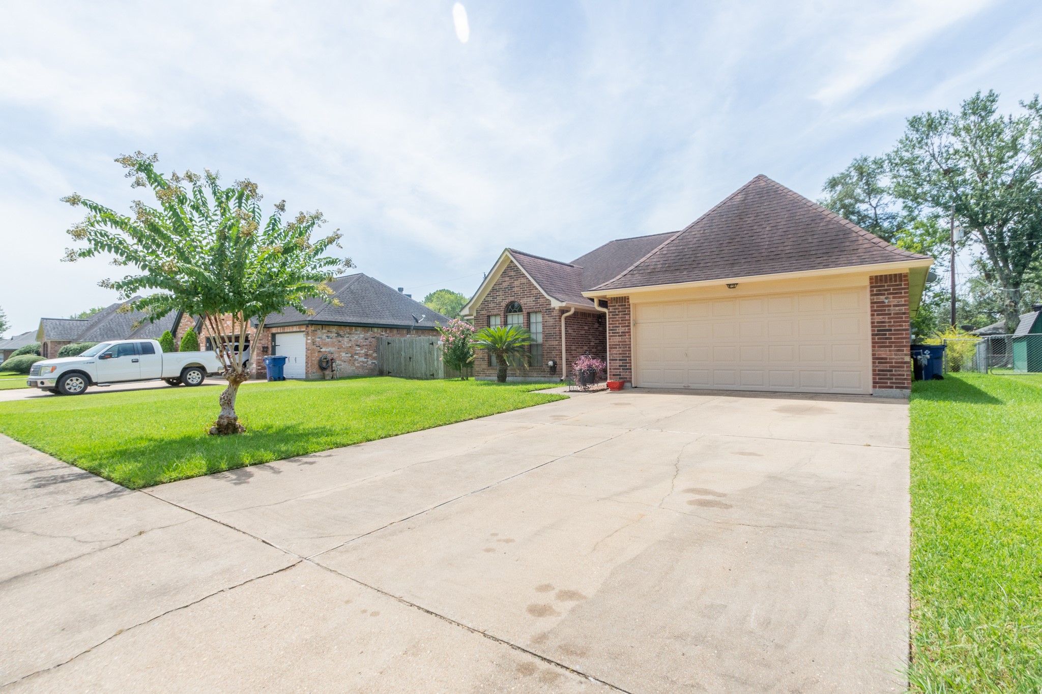 808 Manor Drive Angleton, TX 77515 - Photo 4 of 31 a front view of house with yard and green space