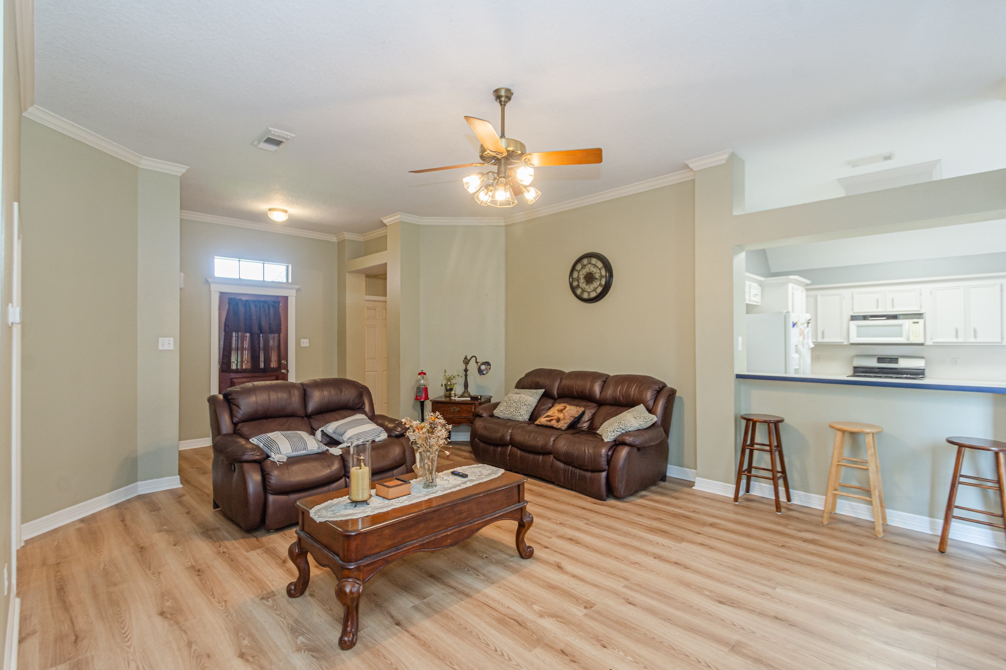 808 Manor Drive Angleton, TX 77515 - Photo 6 of 31 a living room with furniture and a wooden floor