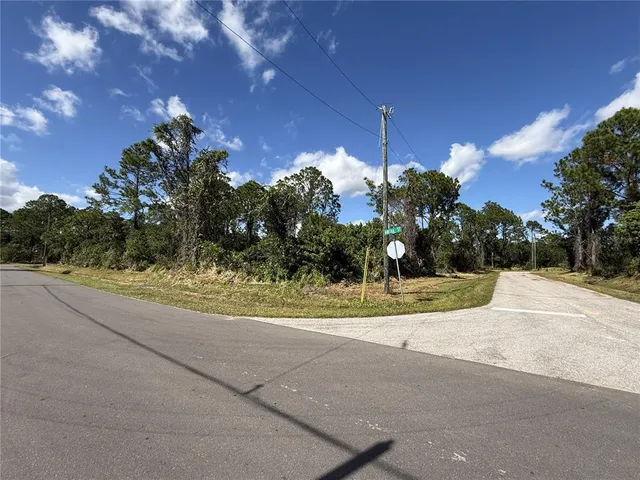 a view of a playground patio and yard