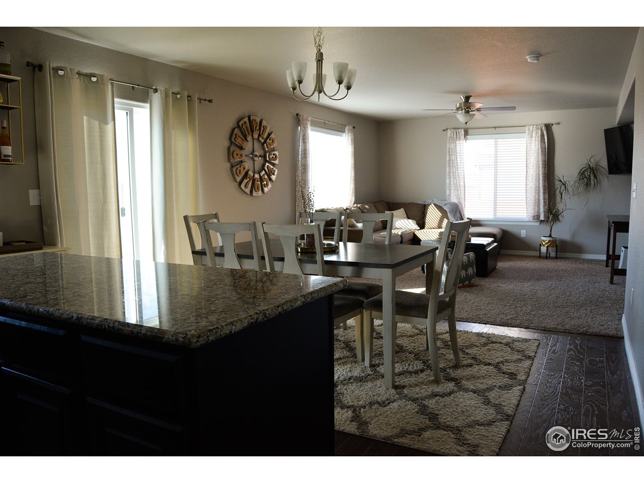 1389 Copeland Falls Road Severance, CO 80550 - Photo 14 of 38 View from kitchen into great room -- perfect for entertaining.