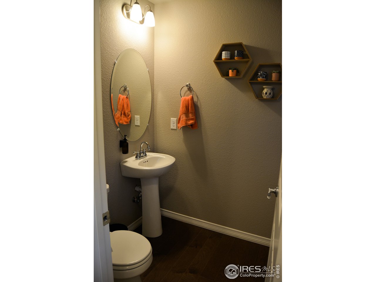 1389 Copeland Falls Road Severance, CO 80550 - Photo 15 of 38 Main level powder room.