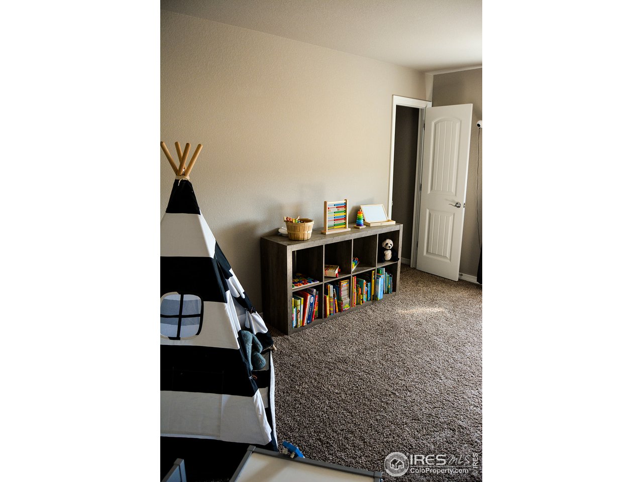 1389 Copeland Falls Road Severance, CO 80550 - Photo 27 of 38 Third bedroom with walk-in closet.