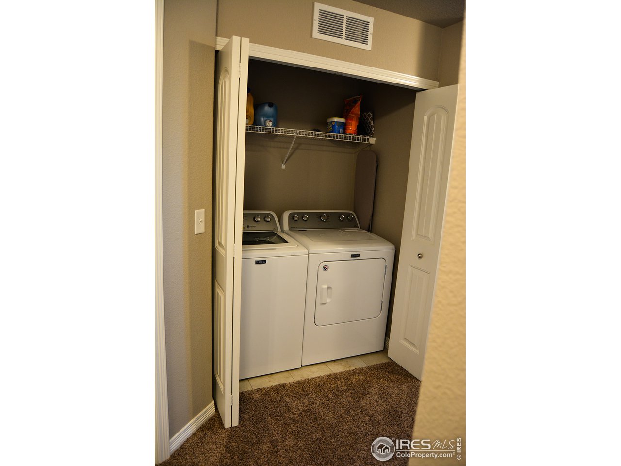 1389 Copeland Falls Road Severance, CO 80550 - Photo 30 of 38 Second level laundry closet.