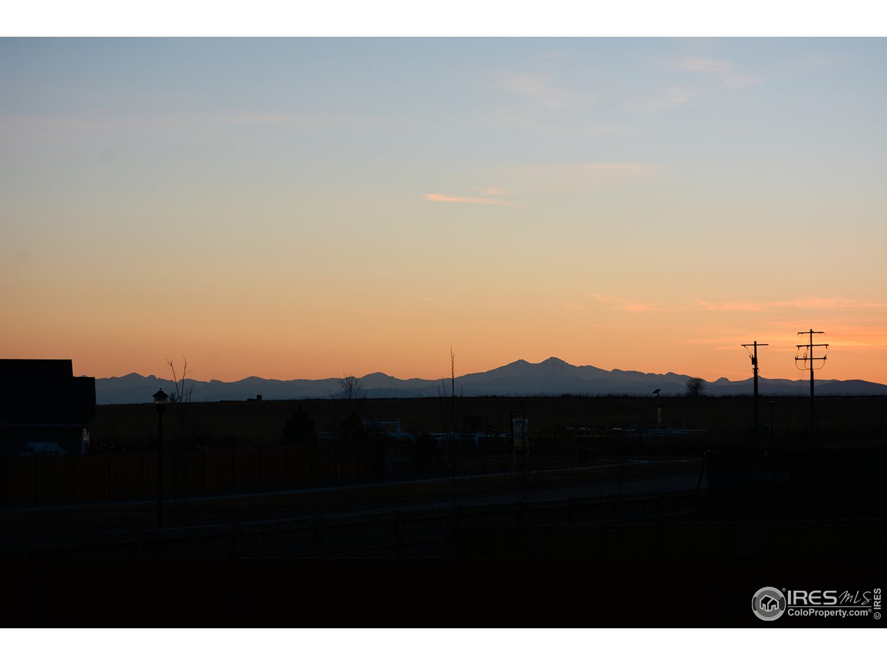 1389 Copeland Falls Road Severance, CO 80550 - Photo 38 of 38 Spectacular sunset with Long's Peak and Mount Meeker in the distance.