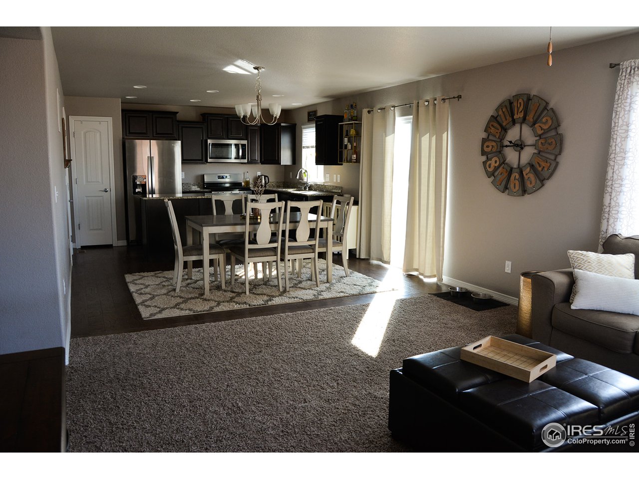 1389 Copeland Falls Road Severance, CO 80550 - Photo 7 of 38 View from great room into dining/kitchen area.