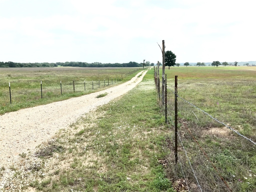 4 Sayers Road Bastrop, TX 78602 - Photo 8 of 15 a view of a lake with a beach