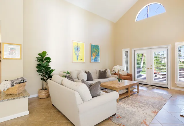 a view of a dining room with furniture and window