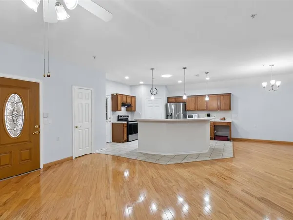 a view of kitchen with wooden floor