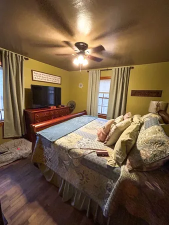 a view of a livingroom with furniture and front door