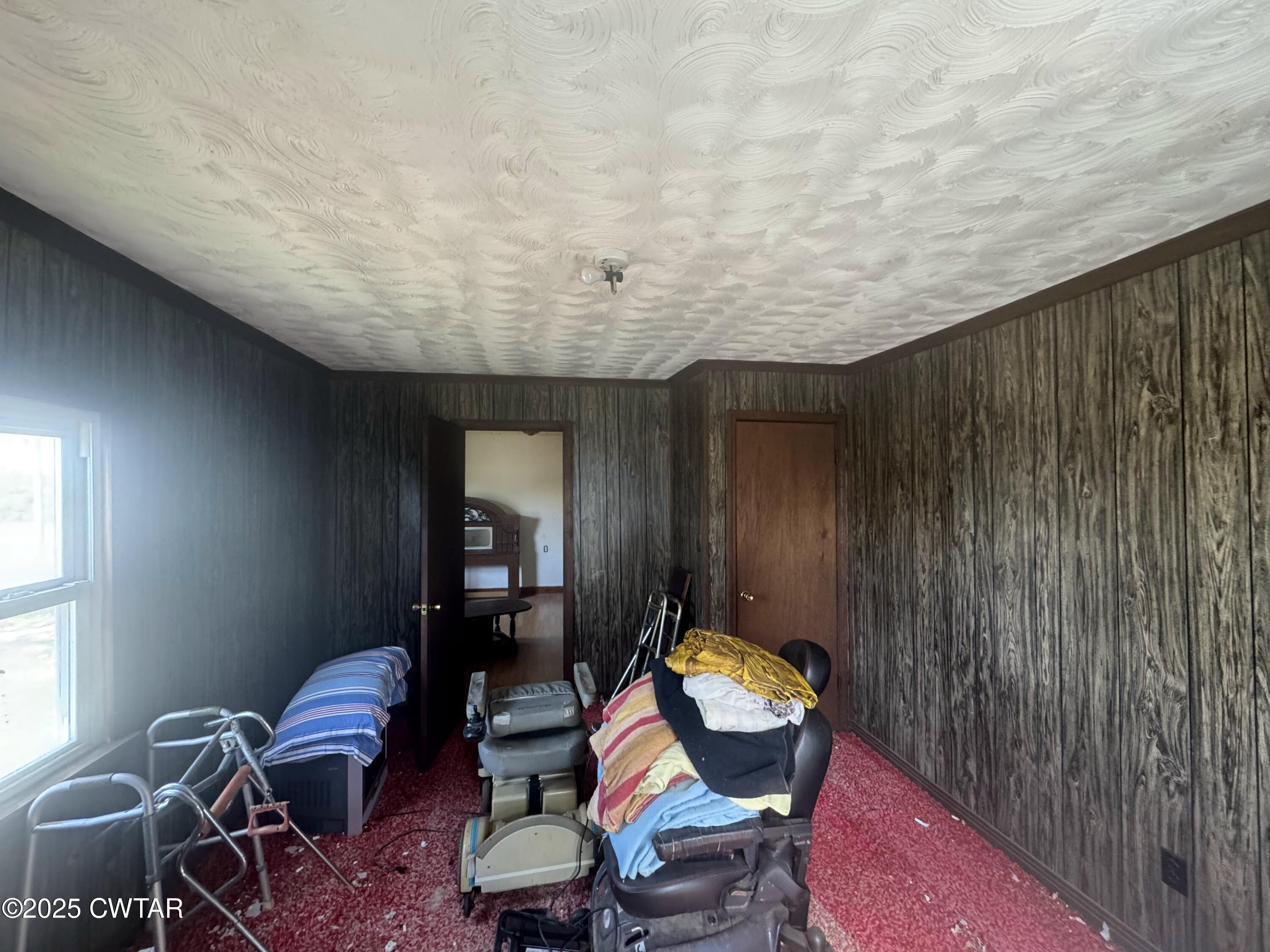 4667 Highway 64 Selmer, TN 38375 - Photo 7 of 10 a living room with furniture and a window