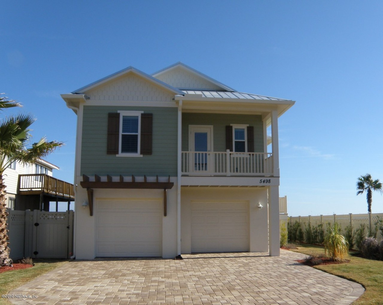 5498 Atlantic View St. Augustine, FL 32080 - Photo 1 of 2 a front view of a house with a yard