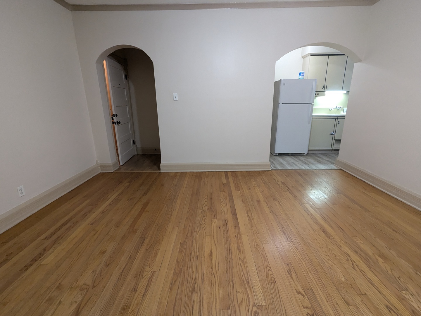 328 West St Charles Road, Unit B2 Lombard, IL 60148 - Photo 12 of 26 a view of empty room with wooden floor