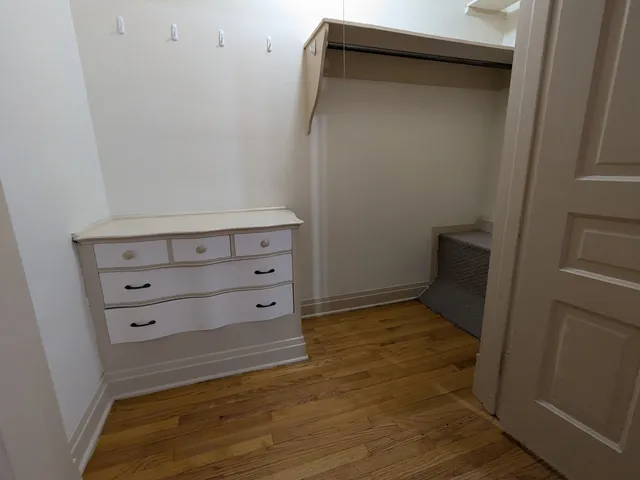 a view of an empty walk in closet