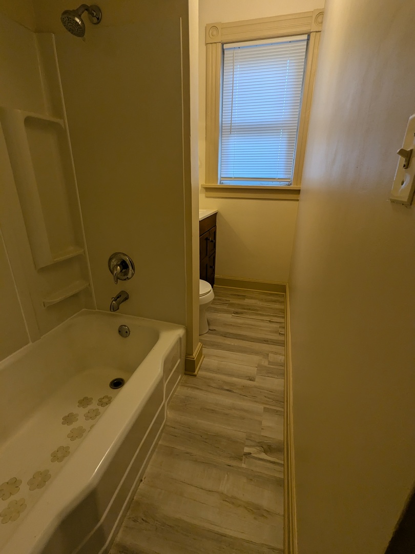 328 West St Charles Road, Unit B2 Lombard, IL 60148 - Photo 26 of 26 a bathroom with a tub and shower