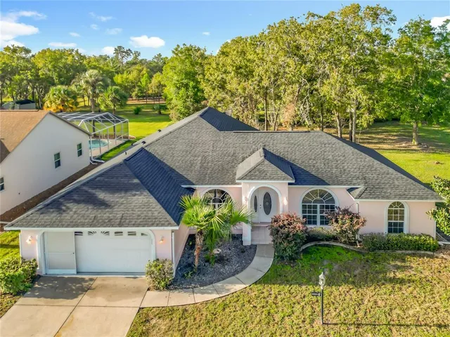 a view of an outdoor space with swimming pool