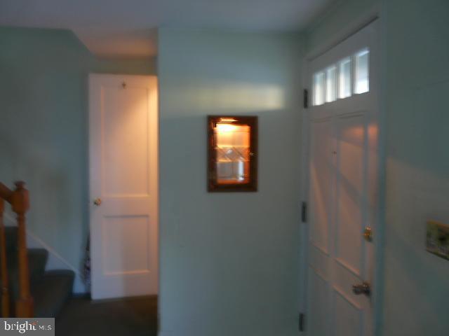 7327 Kirtley Road Baltimore, MD 21224 - Photo 6 of 16 Living Room Lighted Closet