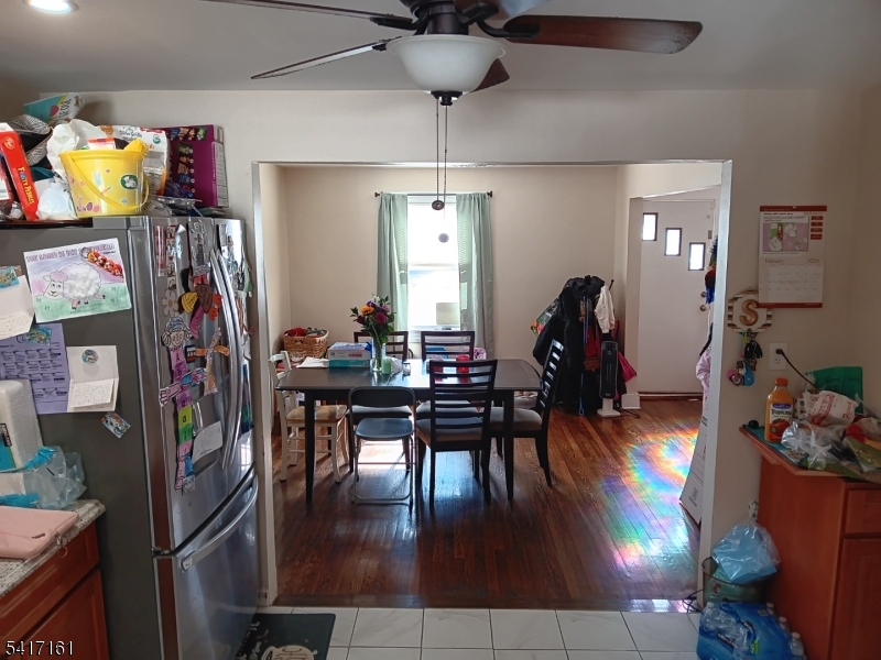 1028 West 5th Street Plainfield, NJ 07063 - Photo 4 of 13 a view of a room with furniture and wooden floor