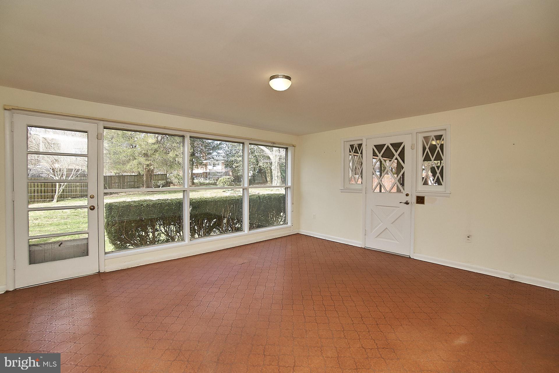 6541 Kerns Road Falls Church, VA 22044 - Photo 21 of 28 Lovely sun room with access to backyard