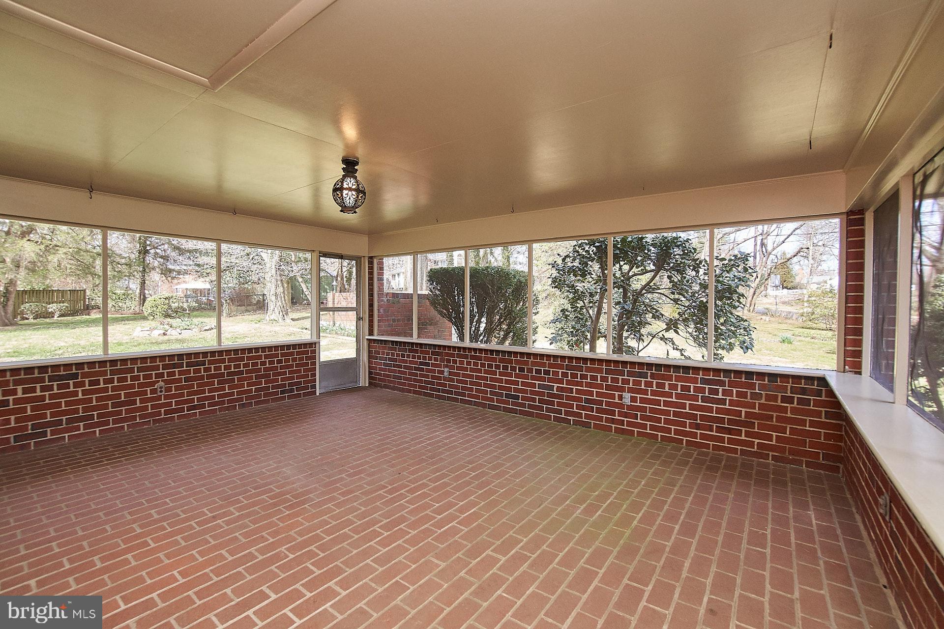 6541 Kerns Road Falls Church, VA 22044 - Photo 23 of 28 Screened-in brick porch- perfect for entertaining!