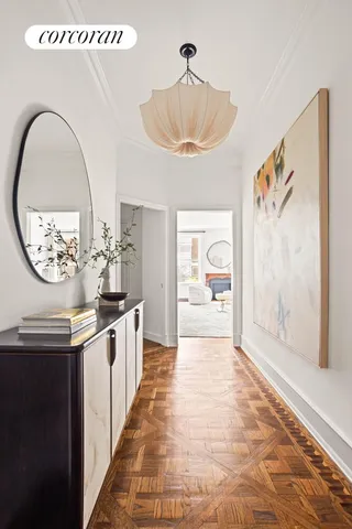 a large kitchen with kitchen island a stove a chimney and a dining table view