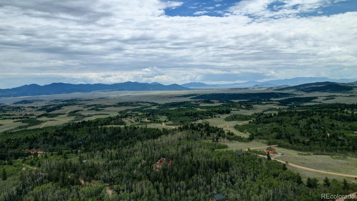 1018 Osprey Road Como, CO 80432 - Photo 7 of 13 a view of a city with lush green forest