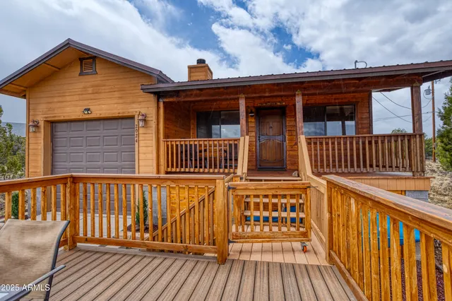 a view of a wooden deck with a bench