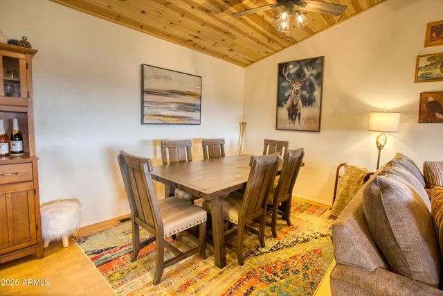 a kitchen with stainless steel appliances granite countertop a refrigerator a stove a sink and dishwasher