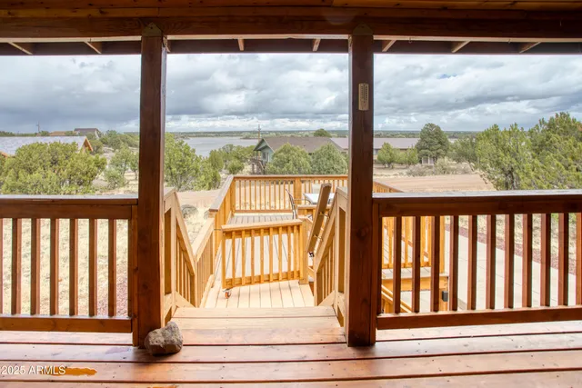 a bathroom with a sink a mirror and vanity