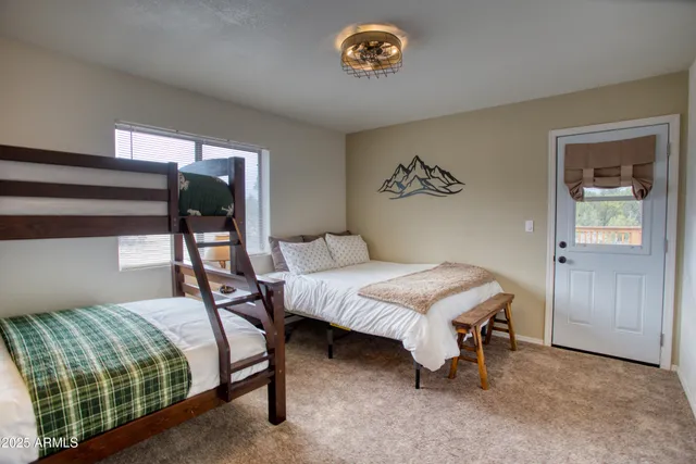 an aerial view of house with yard swimming pool and outdoor seating
