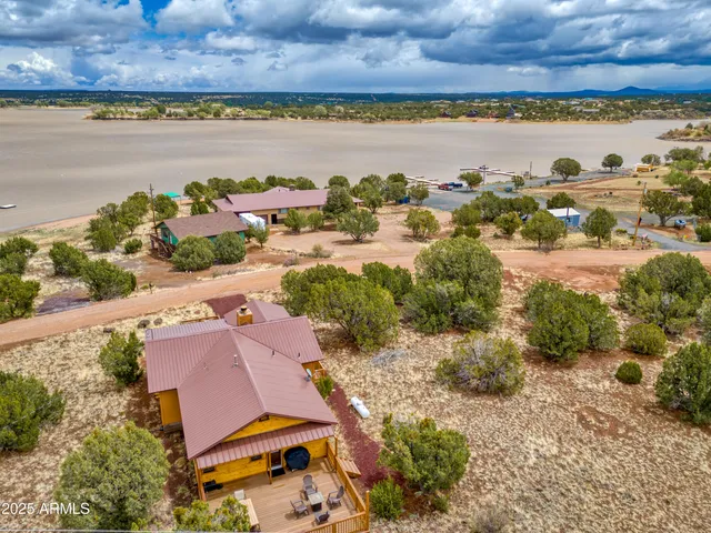 an aerial view of a house with a garden