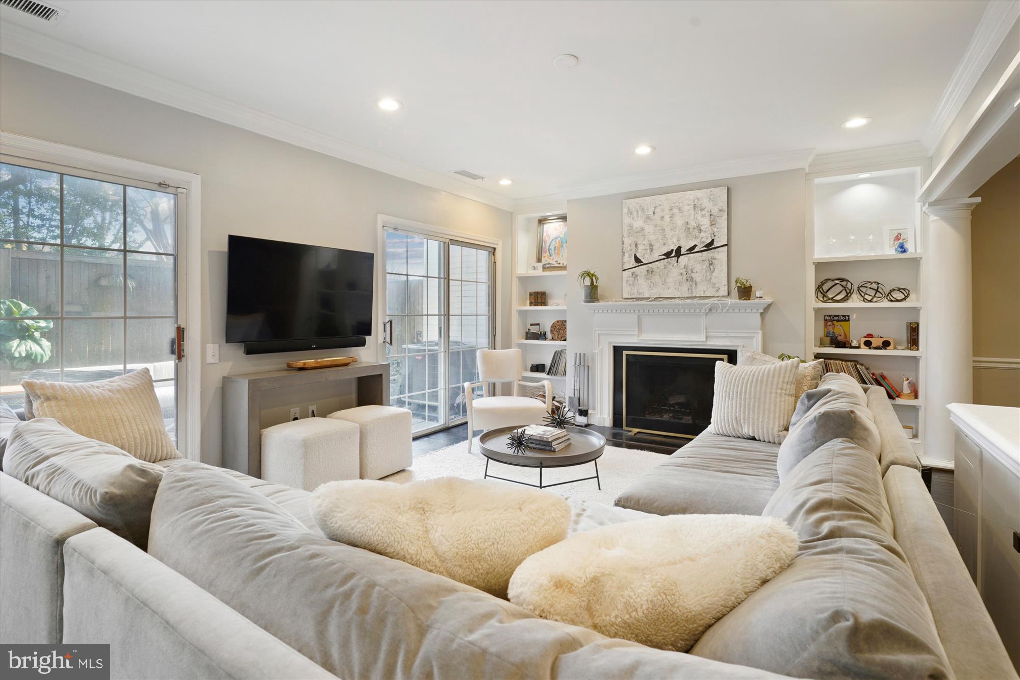 3263 Sutton Place Northwest, Unit C Washington, DC 20016 - Photo 11 of 42 Living room with sliding doors to large patio