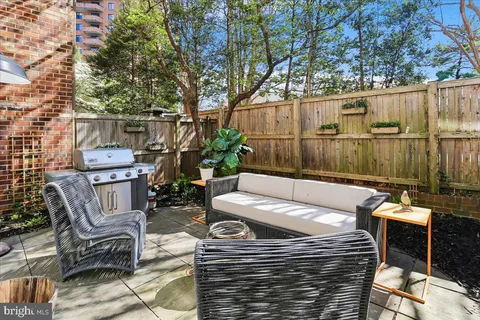 a view of a chairs and tables in the patio