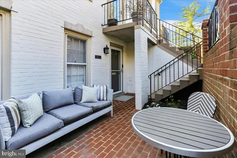 a balcony with furniture