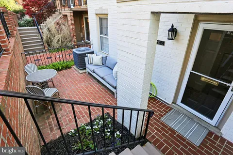 a view of couches in the balcony
